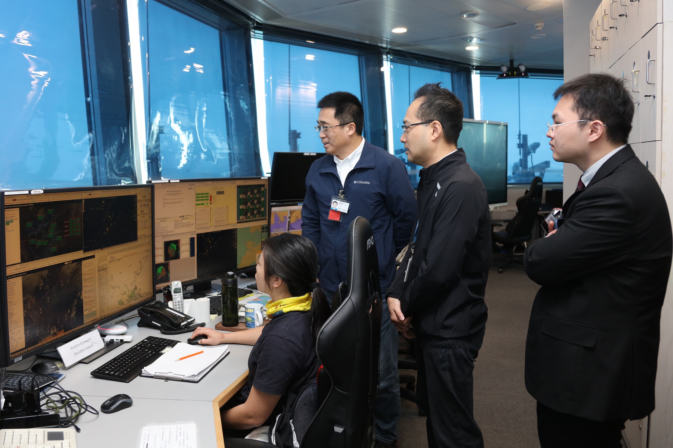 The CAFUC delegation visiting the Airport Meteorological Office of HKO
