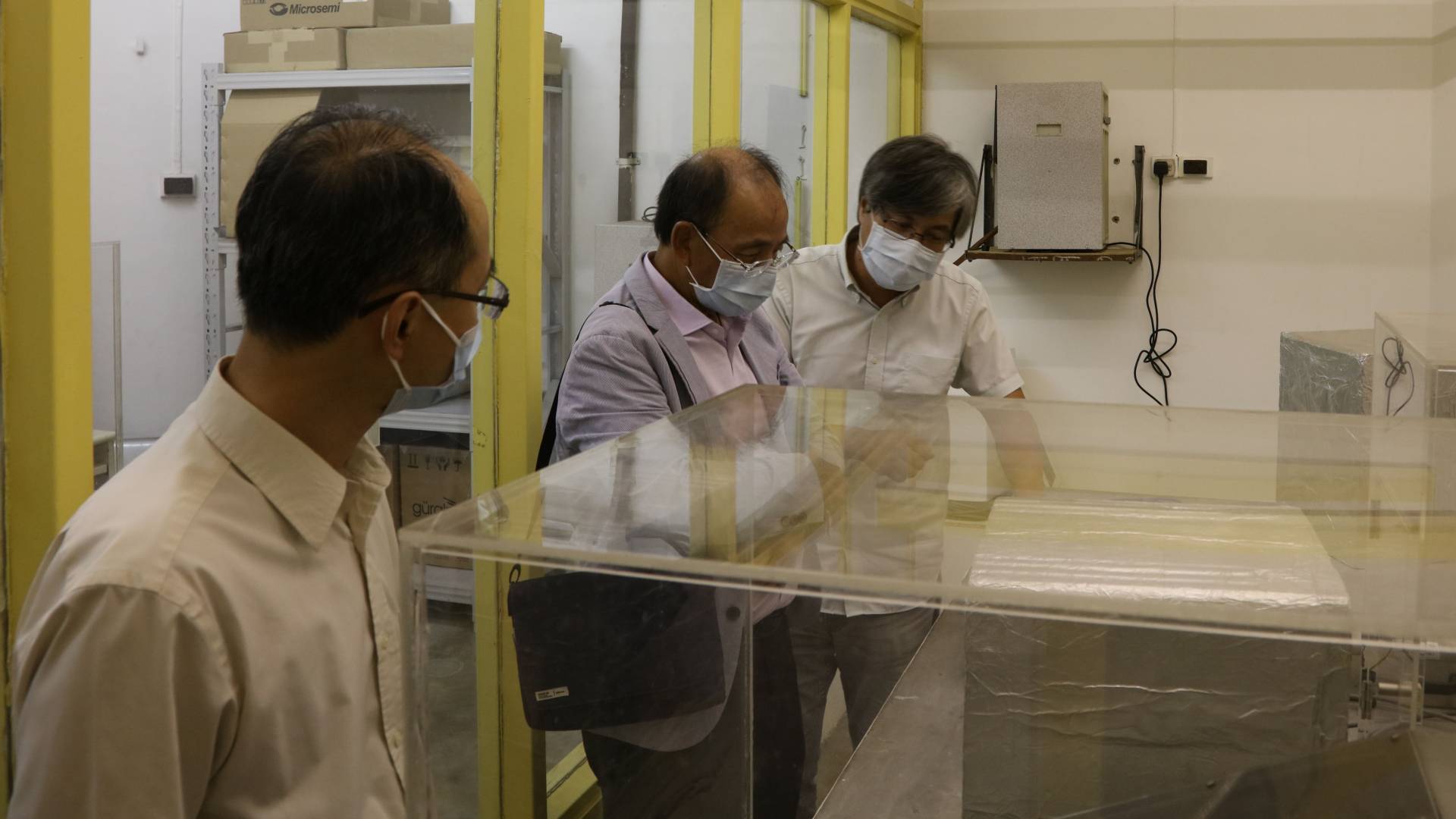 Professor Chan Lung-sang inspecting the seismological instruments