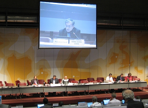 Shun Chi-ming (on screen) presenting the latest developments of the World Weather Information Service at the World Meteorological Congress.