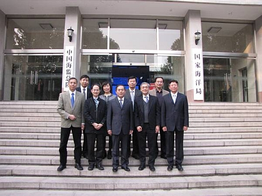 Mr. Shun (second from right in front) photographed with the Deputy Administrator, Mr. Chen Lianzeng (middle in front) after visiting the State Oceanic Administration.