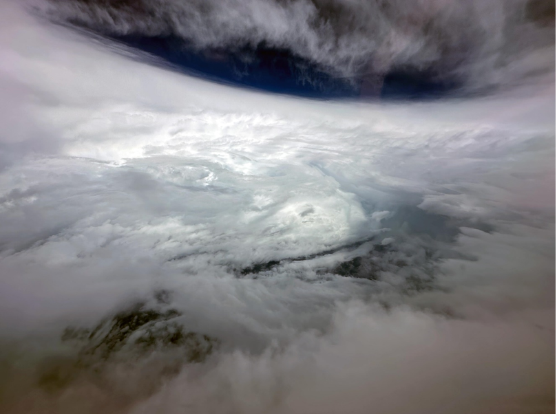 Government Flying Service (GFS) dispatched a fixed-wing aircraft to conduct surveillance near Saola on the morning of 1 September. The photo taken at the aircraft showed that Saola was a mature tropical cyclone with a clear eye and well-defined eyewalls. (Courtesy of GFS).
