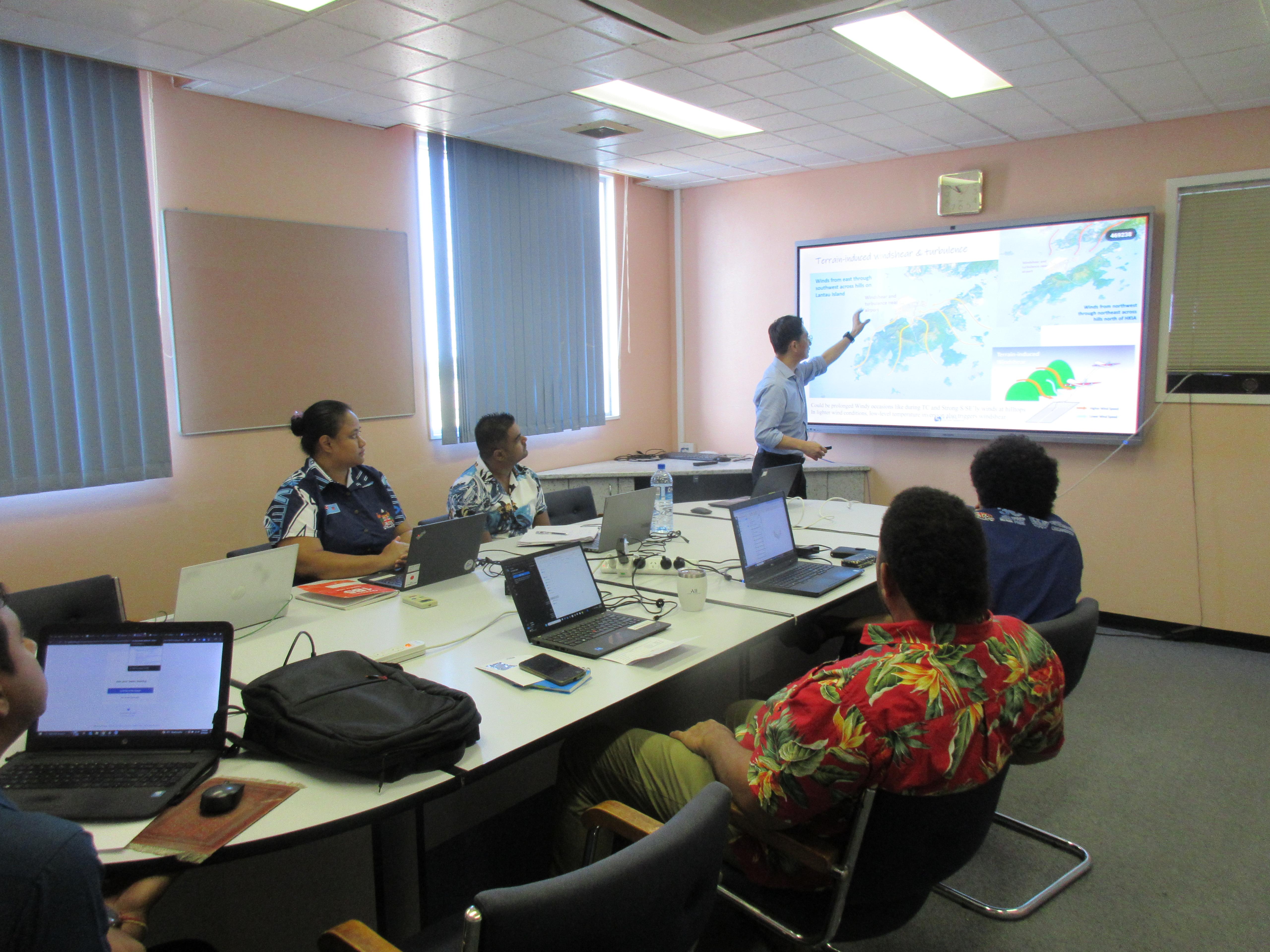 Mr Lau conducting training for weather forecasters of the Fiji Meteorological Service