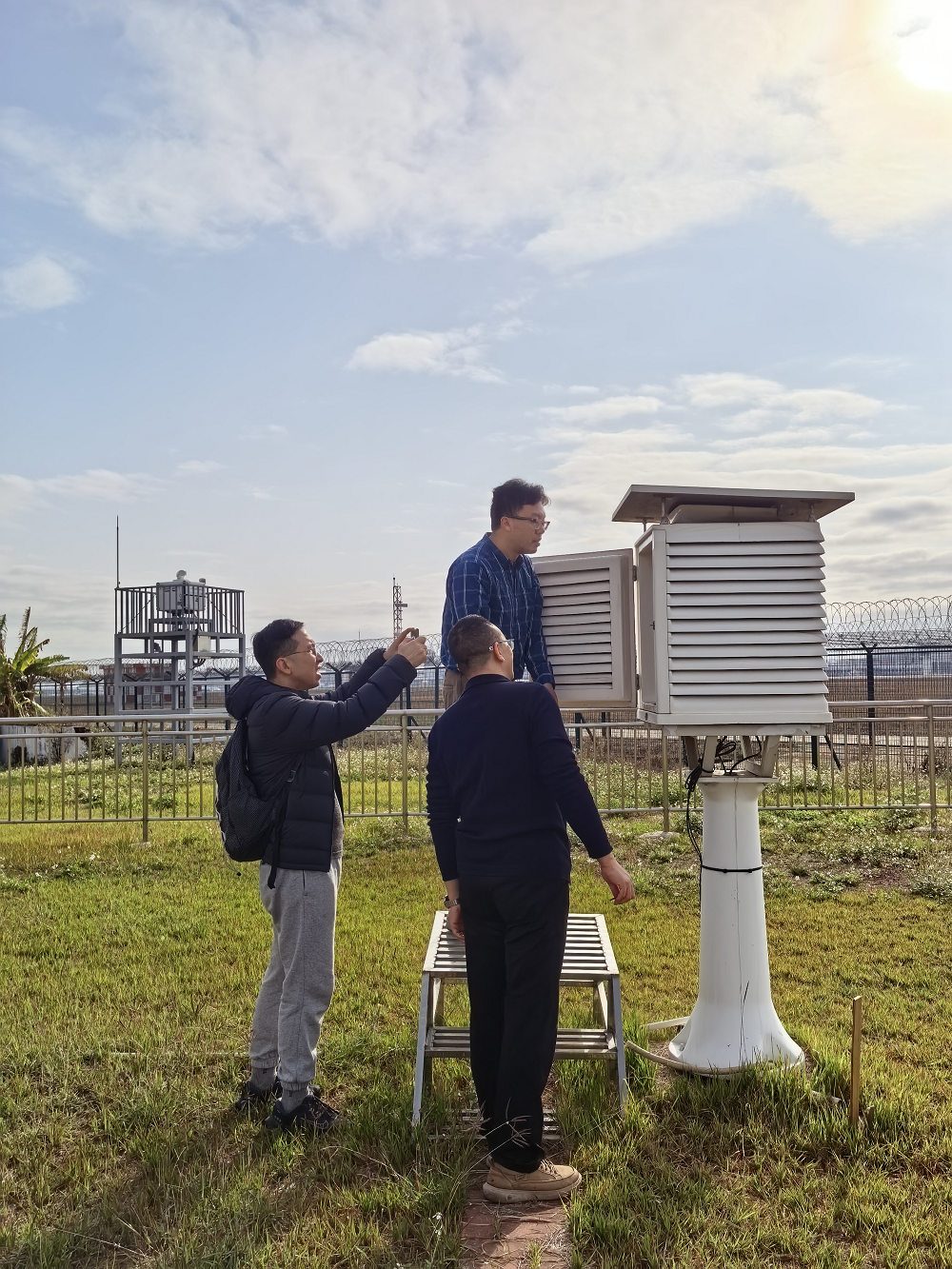 Hong Kong Observatory Radar Specialist Mechanic Mr Fung Kin-wah conducting an on-site inspection of meteorological equipment.