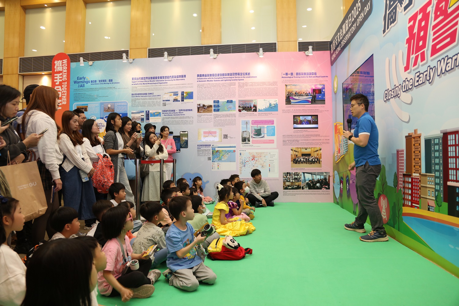 A TV weather presenter giving a live demonstration of weather reporting