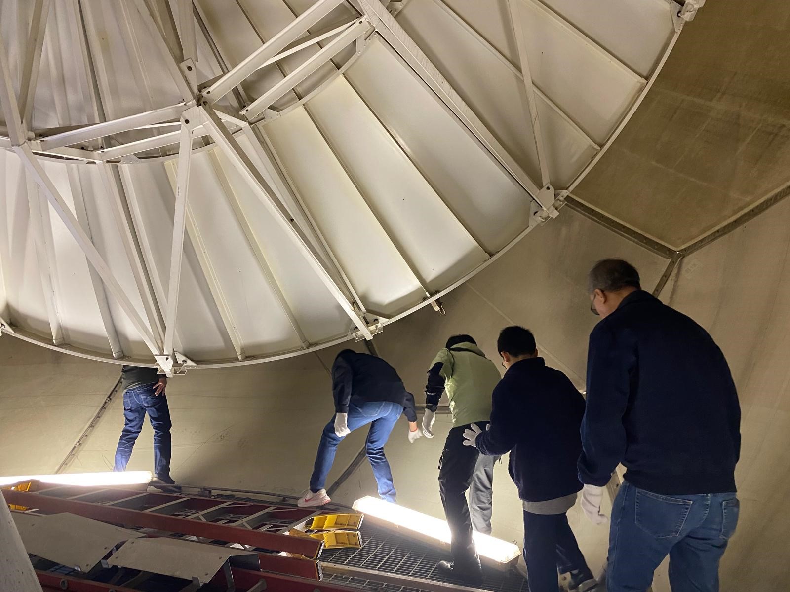 The cadets touring the interior of the radar radome